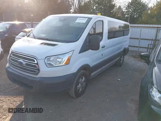 2018 Ford Transit Passenger XL with VIN 1FBZX2YM4JKA44793, listed as a IAAI auction lot 40969026 with 182,541 mi miles and . Bid and sale history available at carsss.com. Image 2.