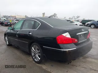 2009 Infiniti M45 Sport with VIN JNKBY01E49M700166, listed as a IAAI auction lot 41884586 with 102,658 mi miles. Bid and sale history available at carsss.com. Image 3.