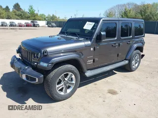 2018 Jeep Wrangler Unlimited Sahara with VIN 1C4HJXEG0JW166645, listed as a IAAI auction lot 42228492 with 58,416 mi miles and . Bid and sale history available at DreamBid. Image 2.