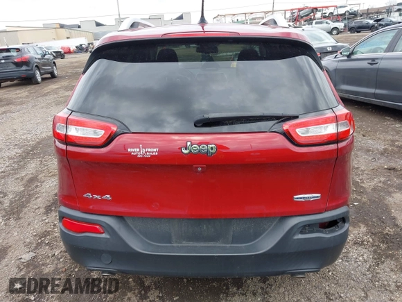2014 Jeep Cherokee Latitude with VIN 1C4PJMCS0EW261021, listed as a IAAI auction lot 41986701 with 114,633 mi miles. Bid and sale history available at carsss.com. Image 13.