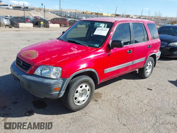 1999 Honda CR-V LX with VIN JHLRD2847XC009921, listed as a IAAI auction lot 41795325 with 268,638 mi miles. Bid and sale history available at carsss.com. Image 2.