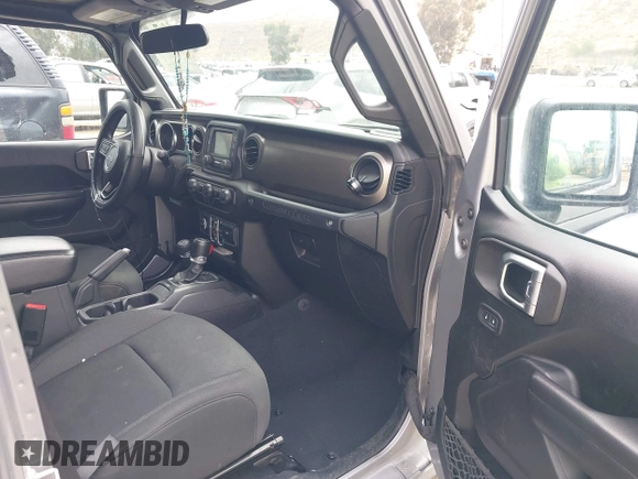 2018 Jeep Wrangler Unlimited Sport S with VIN 1C4HJXDN5JW145340, listed as a IAAI auction lot 42420695 with 92,500 mi miles and . Bid and sale history available at DreamBid. Image 5.