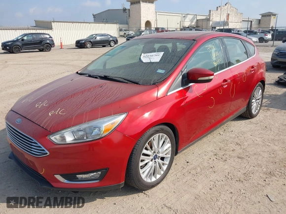 2018 Ford Focus Titanium z VIN 1FADP3N24JL313938, wystawiony jako IAAI lot #42050701 z przebiegiem 162 859 mil mil oraz . Historia ofert i sprzedaży dostępna na DreamBid. Obrazek 18.