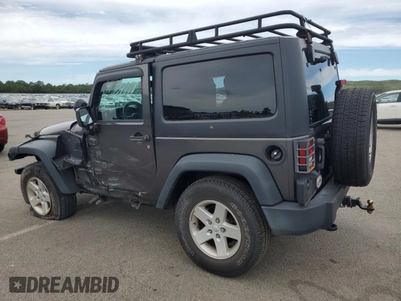 2017 Jeep Wrangler Sport with VIN 1C4GJWAG8HL608093, listed as a Copart auction lot 65006675 with 52,630 mi miles and Salvage title. Bid and sale history available at DreamBid. Image 2.