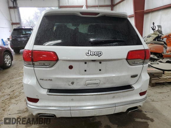 2015 Jeep Grand Cherokee Summit with VIN 1C4RJFJG9FC794992, listed as a Copart auction lot 42790355 with 74,044 mi miles and Salvage Title. Bid and sale history available at DreamBid. Image 6.
