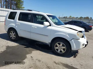 2009 Honda Pilot Touring with VIN 5FNYF48939B039059, listed as a Copart auction lot 50057145 with 218,259 mi miles and Salvage Title. Bid and sale history available at carsss.com. Image 4.