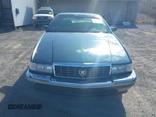 1993 Cadillac Eldorado ESC z VIN 1G6EL12Y4PU609197, wystawiony jako IAAI lot #41902066 z przebiegiem 96 251 mil mil oraz . Historia ofert i sprzedaży dostępna na DreamBid. Obrazek 6.