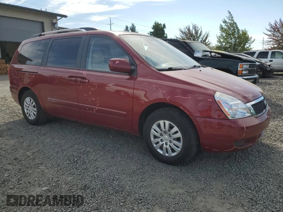 2011 Kia Sedona LX with VIN KNDMG4C72B6369858, listed as a Copart auction lot 70339124 with 165,640 mi miles and Salvage Title. Bid and sale history available at carsss.com. Image 4.