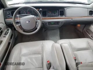 2005 Ford Crown Victoria LX z VIN 2FAFP74W95X166593, wystawiony jako Copart lot #80544294 z przebiegiem 178 591 mil mil oraz Czysty tytuł • Clean title. Historia ofert i sprzedaży dostępna na DreamBid. Obrazek 8.