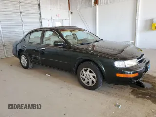 1999 Nissan Maxima GXE z VIN JN1CA21D0XT808755, wystawiony jako Copart lot #49693685 z przebiegiem 63 389 mil mil oraz Szkoda całkowita • Salvage title. Historia ofert i sprzedaży dostępna na DreamBid. Obrazek 4.