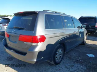 2010 Honda Odyssey EX-L with VIN 5FNRL3H76AB040457, listed as a IAAI auction lot 42214329 with 182,051 mi miles and . Bid and sale history available at carsss.com. Image 4.