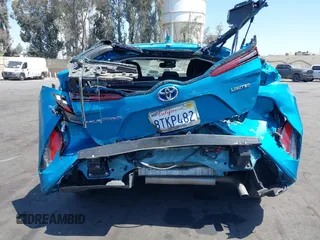 2021 Toyota Prius LE with VIN JTDKAMFP7M3169633, listed as a IAAI auction lot 41986170 with 55,925 mi miles and . Bid and sale history available at DreamBid. Image 17.