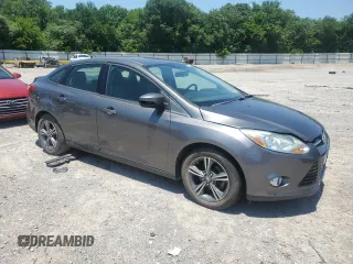 2012 Ford Focus SE with VIN 1FAHP3F27CL450763, listed as a Copart auction lot 61091755 with Not provided miles and Clean title. Bid and sale history available at DreamBid. Image 4.