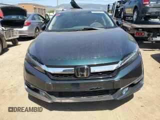 2020 Honda Clarity z VIN JHMZC5F10LC002182, wystawiony jako Copart lot #55901315 z przebiegiem 65 674 mil mil oraz Szkoda całkowita • Salvage title. Historia ofert i sprzedaży dostępna na DreamBid. Obrazek 5.
