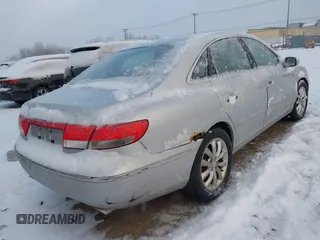 2006 Hyundai Azera SE with VIN KMHFC46F46A093575, listed as a IAAI auction lot 41259753 with 164,453 mi miles and . Bid and sale history available at DreamBid. Image 4.