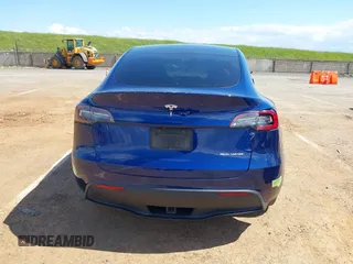 2020 Tesla Model Y Long Range with VIN 5YJYGDEF4LF000494, listed as a IAAI auction lot 41894856 with 118,638 mi miles and . Bid and sale history available at DreamBid. Image 15.