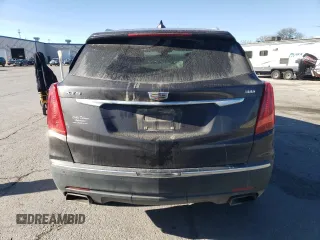 2017 Cadillac XT5 Premium Luxury FWD z VIN 1GYKNCRS2HZ114664, wystawiony jako Copart lot #84624944 z przebiegiem 153 882 mil mil oraz Szkody całkowita. Historia ofert i sprzedaży dostępna na DreamBid. Obrazek 6.