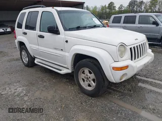 2002 Jeep Liberty Limited z VIN 1J4GL58K72W195100, wystawiony jako IAAI lot #41952471 z przebiegiem 80 663 mil mil oraz . Historia ofert i sprzedaży dostępna na DreamBid. Obrazek 1.
