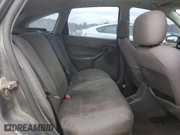 2004 Ford Focus ZX5 z VIN 3FAHP37324R110690, wystawiony jako Copart lot #49965085 z przebiegiem 178 749 mil mil oraz Czysty tytuł • Clean title. Historia ofert i sprzedaży dostępna na DreamBid. Obrazek 10.