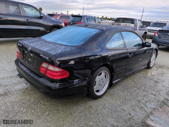 2002 Mercedes-Benz CLK-Class AMG with VIN WDBLJ74G32T102631, listed as a Copart auction lot 74875534 with 0 mi miles and Salvage Title. Bid and sale history available at carsss.com. Image 3.