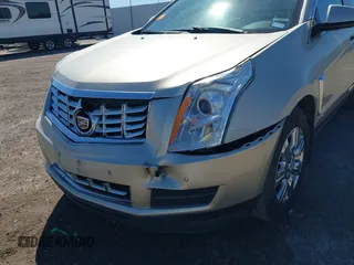 2015 Cadillac SRX Luxury Collection z VIN 3GYFNBE38FS641807, wystawiony jako IAAI lot #41669512 z przebiegiem 147 889 mil mil oraz . Historia ofert i sprzedaży dostępna na DreamBid. Obrazek 6.