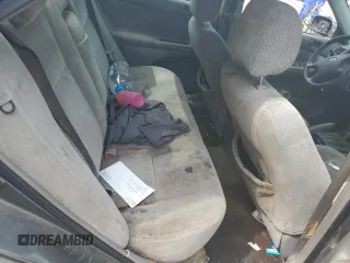 2004 Toyota Camry LE z VIN 4T1BE32K74U848946, wystawiony jako Copart lot #56030995 z przebiegiem Nie podano mil oraz Szkoda całkowita • Salvage title. Historia ofert i sprzedaży dostępna na DreamBid. Obrazek 10.