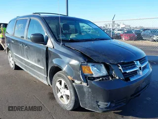 2010 Dodge Grand Caravan SXT z VIN 2D4RN5D13AR369390, wystawiony jako IAAI lot #41679975 z przebiegiem 210 514 mil mil oraz . Historia ofert i sprzedaży dostępna na DreamBid. Obrazek 1.
