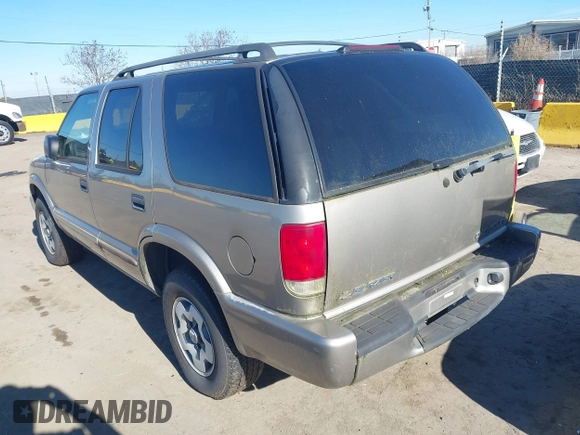2002 Chevrolet Blazer LS z VIN 1GNDT13W52K213071, wystawiony jako IAAI lot #41336010 z przebiegiem 157 758 mil mil oraz . Historia ofert i sprzedaży dostępna na DreamBid. Obrazek 3.