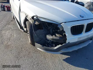 2015 BMW X1 xDrive28i with VIN WBAVL1C50FVY26009, listed as a IAAI auction lot 41495667 with 109,807 mi miles. Bid and sale history available at carsss.com. Image 6.