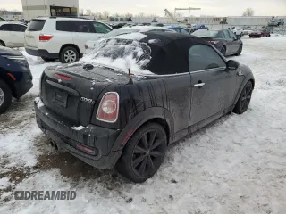 2013 MINI Roadster S z VIN WMWSY3C58DT566208, wystawiony jako Copart lot #41480595 z przebiegiem 119 265 mil mil oraz Szkody całkowita. Historia ofert i sprzedaży dostępna na DreamBid. Obrazek 3.