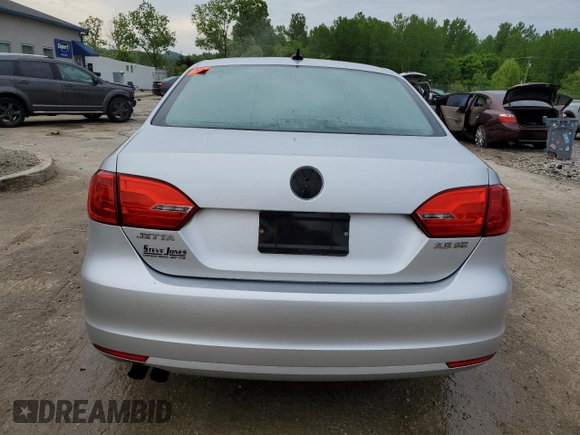 2013 Volkswagen Jetta SE z VIN 3VWDX7AJ3DM450464, wystawiony jako Copart lot #55464505 z przebiegiem 201 001 mil mil oraz Nie do naprawy • Non repairable. Historia ofert i sprzedaży dostępna na DreamBid. Obrazek 6.