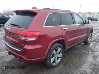 2014 Jeep Grand Cherokee Overland with VIN 1C4RJFCG9EC299235, listed as a IAAI auction lot 41670065 with 108,589 mi miles and . Bid and sale history available at DreamBid. Image 4.