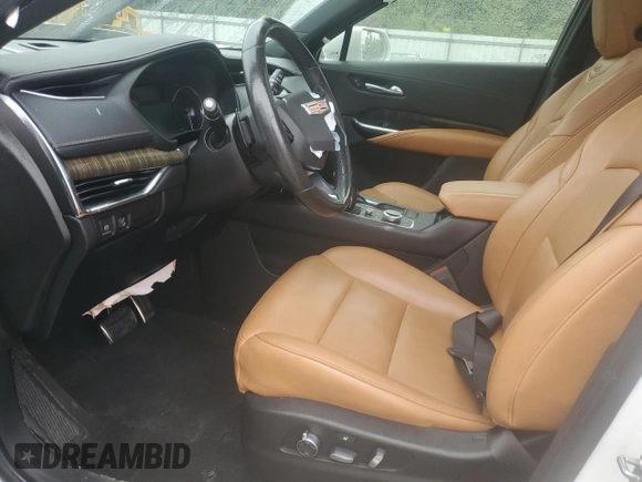 2019 Cadillac XT4 FWD Sport z VIN 1GYFZER49KF199885, wystawiony jako Copart lot #56836895 z przebiegiem 58 486 mil mil oraz Szkoda całkowita • Salvage title. Historia ofert i sprzedaży dostępna na DreamBid. Obrazek 7.
