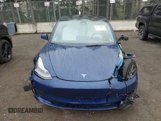 2023 Tesla Model 3 Long Range with VIN 5YJ3E1EB5PF704463, listed as a IAAI auction lot 41916627 with 14,305 mi miles and . Bid and sale history available at DreamBid. Image 12.