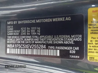 2014 BMW 2 Series 228i with VIN WBA1F5C5XEV255284, listed as a IAAI auction lot 41895642 with 62,079 mi miles and . Bid and sale history available at carsss.com. Image 9.