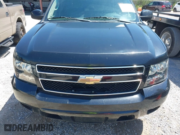 2011 Chevrolet Suburban LT with VIN 1GNSCJE09BR319675, listed as a IAAI auction lot 41966225 with 294,335 mi miles. Bid and sale history available at carsss.com. Image 12.