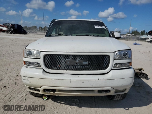 2001 GMC Yukon XL SLT with VIN 1GKEC16T51J253741, listed as a Copart auction lot 77461934 with 0 mi miles and Salvage Title. Bid and sale history available at carsss.com. Image 5.