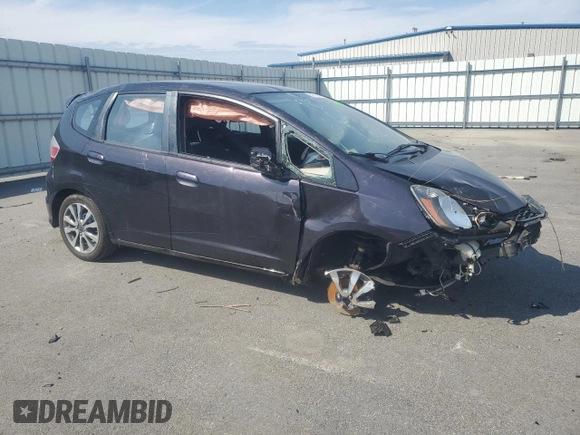 2013 Honda Fit Sport with VIN JHMGE8H57DC061007, listed as a Copart auction lot 52781015 with 176,667 mi miles and Clean Title. Bid and sale history available at carsss.com. Image 4.
