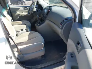 2009 Kia Sedona LX with VIN KNDMB233096312990, listed as a IAAI auction lot 41261428 with 254,323 mi miles. Bid and sale history available at carsss.com. Image 5.