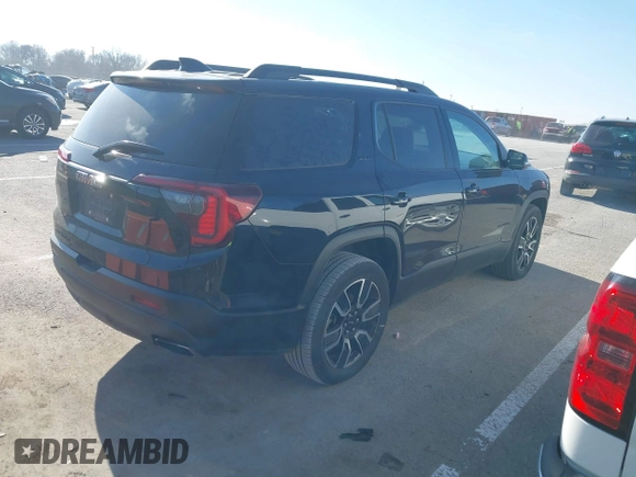 2021 GMC Acadia SLE with VIN 1GKKNKLS9MZ138922, listed as a IAAI auction lot 41206831 with 127,834 mi miles and . Bid and sale history available at DreamBid. Image 4.