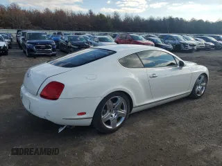 2005 Bentley Continental GT GT z VIN SCBCR63W65C028979, wystawiony jako Copart lot #67127323 z przebiegiem 100 646 mil mil oraz Szkoda całkowita • Salvage title. Historia ofert i sprzedaży dostępna na DreamBid. Obrazek 3.