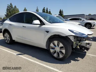 2022 Tesla Model Y Long Range with VIN 7SAYGDEE0NA020896, listed as a Copart auction lot 52780555 with 10,117 mi miles and Salvage Title. Bid and sale history available at carsss.com. Image 4.