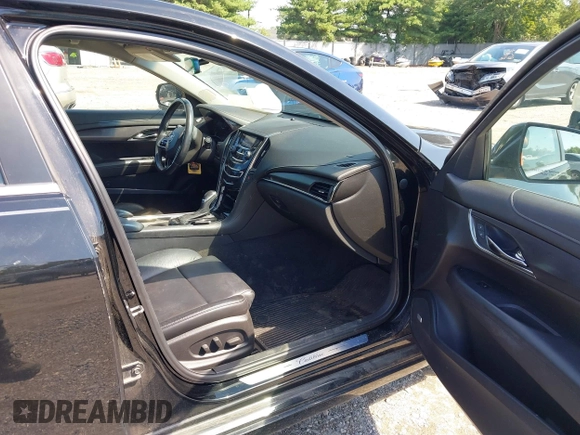 2014 Cadillac ATS Standard RWD with VIN 1G6AA5RA0E0102256, listed as a IAAI auction lot 42659190 with 116,912 mi miles and . Bid and sale history available at DreamBid. Image 5.