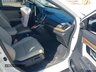 2018 Honda CR-V Touring with VIN 2HKRW2H92JH662753, listed as a IAAI auction lot 39538586 with 83,202 mi miles. Bid and sale history available at carsss.com. Image 5.