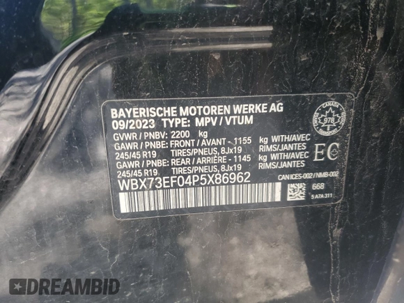 2023 BMW X1 xDrive28i with VIN WBX73EF04P5X86962, listed as a Copart auction lot 57575815 with 95,965 mi miles and Salvage title. Bid and sale history available at DreamBid. Image 14.