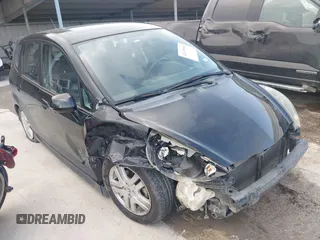 2007 Honda Fit Sport with VIN JHMGD37647S055935, listed as a IAAI auction lot 42639900 with 205,252 mi miles and . Bid and sale history available at DreamBid. Image 1.