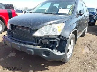 2007 Honda CR-V LX with VIN JHLRE48307C072357, listed as a IAAI auction lot 41850670 with 199,479 mi miles. Bid and sale history available at carsss.com. Image 6.
