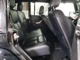 2015 Jeep Wrangler Unlimited Rubicon Hard Rock with VIN 1C4HJWFG4FL676868, listed as a Copart auction lot 48489525 with 100,771 mi miles and Salvage title. Bid and sale history available at DreamBid. Image 10.