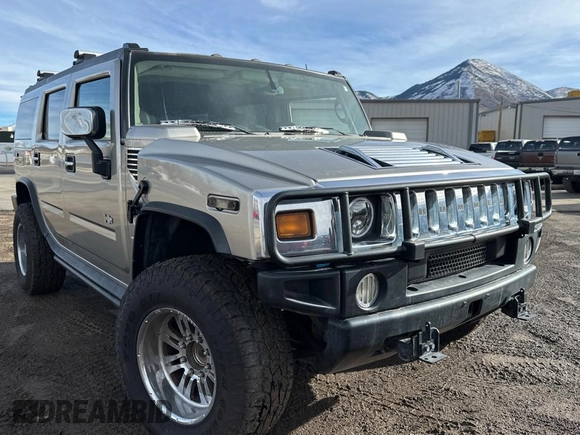 2003 Hummer H2 with VIN 5GRGN23UX3H124517, listed as a Copart auction lot 41650395 with 999,999 mi miles and Clean Title. Bid and sale history available at carsss.com. Image 1.