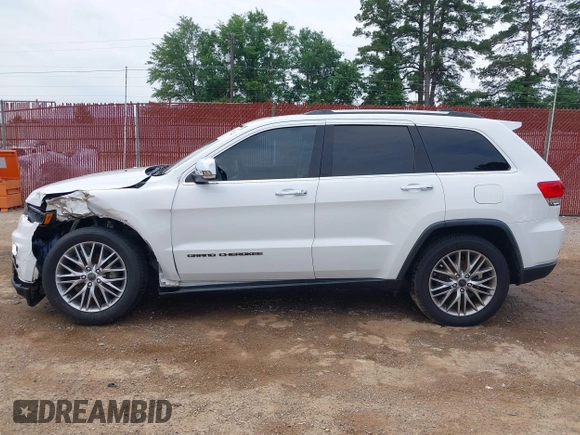2018 Jeep Grand Cherokee Sterling with VIN 1C4RJEBG8JC289169, listed as a IAAI auction lot 42267113 with 77,274 mi miles and . Bid and sale history available at DreamBid. Image 14.